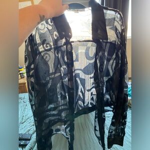 Shear long sleeve top / tie top.